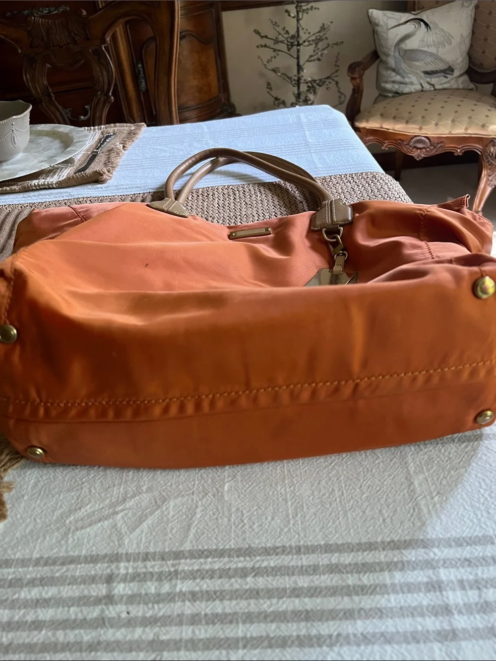 Tumi Orange Nylon Tote with Tan Leather Handles. Pre owned.